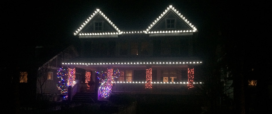 A home decorated with holiday lighting in Calgary, Alberta.