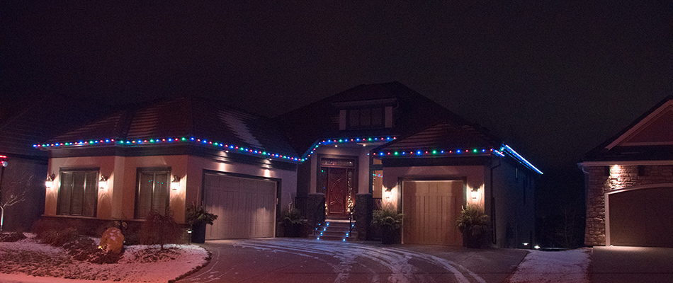 Holiday lights hung around a residential house in Langdon, AB.